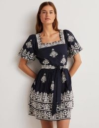 Boden Square Neck Rara Dress Navy, Ivory Embroidery – women’s dark blue cotton short sleeved square neck dresses – belted tie waist – layered tiered hem – fit and flare