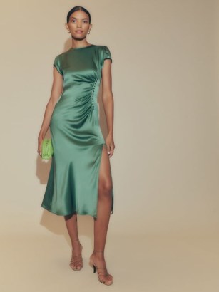 Reformation Tatianna Silk Dress in Bottle Green ~ slinky slim fitting evening dresses ~ fluid fabric occasion clothes ~ high slit hem ~ off center button detail with gathering - flipped