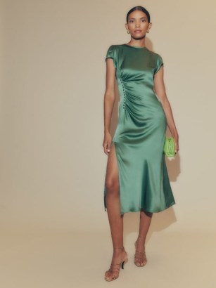 Reformation Tatianna Silk Dress in Bottle Green ~ slinky slim fitting evening dresses ~ fluid fabric occasion clothes ~ high slit hem ~ off center button detail with gathering