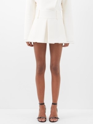 MAXIMILIAN DAVIS Madeline inverted-pleat crepe mini skirt in ivory | women’s chic pleated short length skirts | MATCHESFASHION | womens designer fashion