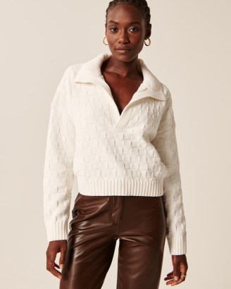 Abercrombie & Fitch Checkerboard Stitch Notch-Neck Sweater in White | women’s polo sweaters | womens knitted collared pullovers | on-trend jumpers - flipped