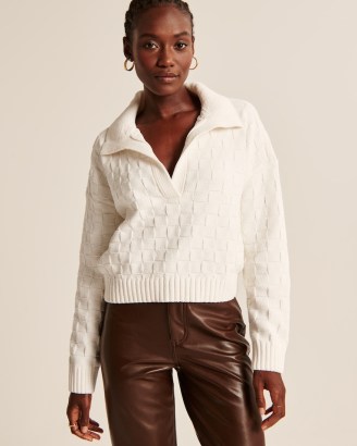 Abercrombie & Fitch Checkerboard Stitch Notch-Neck Sweater in White | women’s polo sweaters | womens knitted collared pullovers | on-trend jumpers