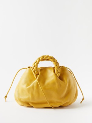 HEREU Bombon braided-handle leather cross-body bag in yellow – small top handle bags – matchesfashion