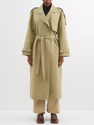 THE FRANKIE SHOP Suzanne cotton-canvas trench coat in beige | women’s chic tie waist belted coats | MATCHESFASHION - flipped