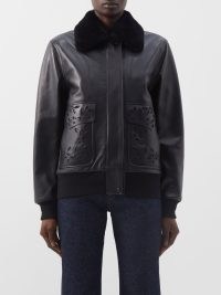 CHLOÉ Floral-cutout shearling and leather bomber jacket in black / women’s luxe designer winter jackets
