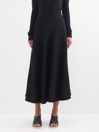 RAEY Organic wool-crepe circle midi skirt in black | flared hem skirts