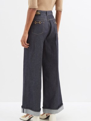 GUCCI Horsebit selvedge wide-leg jeans in blue ~ women’s vintage style denim fashion ~ women’s casual retro clothes ~ matchesfashion ~ snaffle back pocket detail - flipped