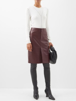 BOTTEGA VENETA Front-slit leather pencil skirt in burgundy | luxe split hem skirts | matchesfashion | women’s clothes in rich autumn colours