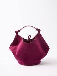 KHAITE Lotus mini suede tote bag in burgundy / small sculptural bags / jewel tone top handle handbags / matchesfashion