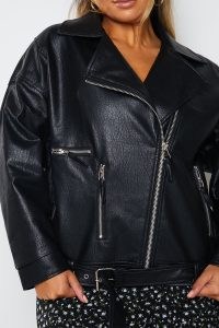 CARYS WHITTAKER BLACK FAUX LEATHER OVERSIZED BIKER JACKET – casual zip and buckle detail jackets
