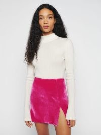 Reformation Cleo Velvet Skirt in Flambe – luxe pink slit hem mini skirts