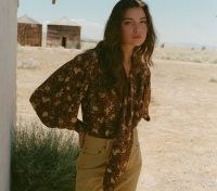 Kaia Gerber brown printed tie neck blouse, DÔEN CORENTIN TOP IN CHERRYWOOD WINDING VINE FLORAL, out in Santa Monica, 17 September 2022 | celebrity street fashion | star style tops / blouses | models off duty clothes USA
