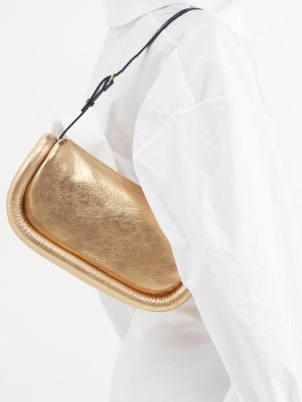 JW ANDERSON Bumper Baguette metallic-leather shoulder bag in gold – luxe 90s style handbags – glamorous 1990s style designer bags – MATCHESFASHION
