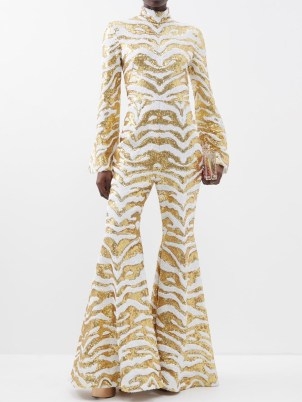 HALPERN Tiger-stripe sequinned flared jumpsuit in gold and white – glamorous retro jumpsuits – matchesfashion – 70s vintage style occasion fashion – funky 1970s inspired event clothes – women’s animal sequin covered evening wear - flipped