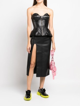 Natasha Zinko zip-front corset top in jet black – strapless leather peplum tops – fitted bodice fashion – farfetch - flipped
