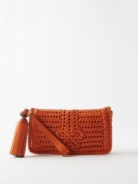 ANYA HINDMARCH Neeson tassel braided-leather clutch bag in orange – small wristlet strap envelope bags – matchesfashion