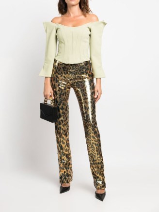 Paco Rabanne sequin-embellished leopard-print trousers in gold tone – glamorous metallic fashion – sequinned animal print pants - flipped