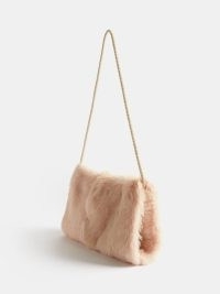 RAEY Stringed shearling pocket muff in pink ~ women’s luxe winter muffs ~ MATCHESFASHION