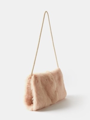 RAEY Stringed shearling pocket muff in pink ~ women’s luxe winter muffs ~ MATCHESFASHION - flipped