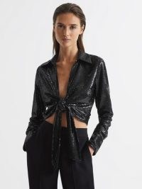 Reiss HANNAH TIE FRONT SEQUIN TOP BLACK ~ sequinned tie waist evening tops ~ glittering cropped occasion shirts ~ women’s glamorous luxe style party clothes