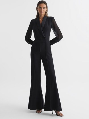 Reiss LENNON TUXEDO JUMPSUIT BLACK | long sheer sleeved flared hem evening jumpsuits | chic evening event fashion | sophisticated party clothes