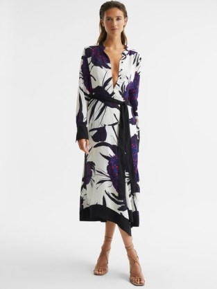 REISS LINA LARGE SCALE FLORAL MIDI DRESS PURPLE – bold flower print dresses with a belted tie waist – chic clothes