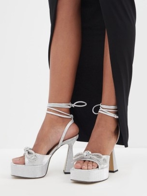MACH & MACH Double Bow 140 crystal and leather sandals in silver / chunky metallic ankle wrap platforms / luxe retro look occasion footwear / women’s glamorous party high heels / matchesfashion / square open toe platform evening shoes / 70s vintage inspired fashion