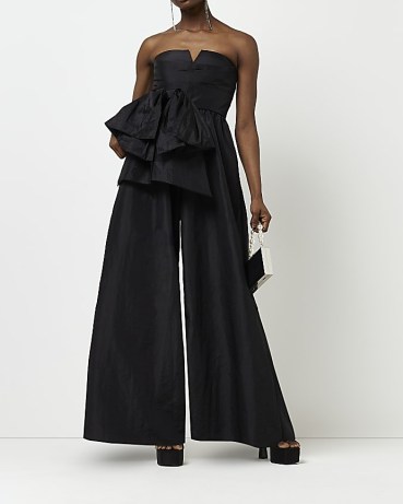 RIVER ISLAND BLACK FRILL BANDEAU JUMPSUIT | strapless ruffle detail evening occasion jumpsuits | glamorous party fashion - flipped
