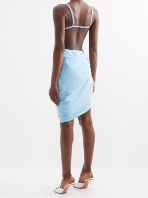 JACQUEMUS Saudade asymmetric cotton dress in blue – strappy open back occasion dresses – asymmetrical side drape detail – matchesfashion - flipped