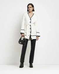 River Island CREAM BELTED LONGLINE CARDIGAN | button up rib knit tie waist cardigans | knitted fashion