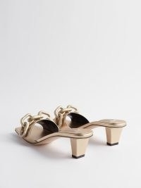 SERENA UZIYEL Catena 50 chain-embellished leather sandals in gold ~ metallic evening mules ~ glamorous occasion shoes ~ matchesfashion ~ square toes