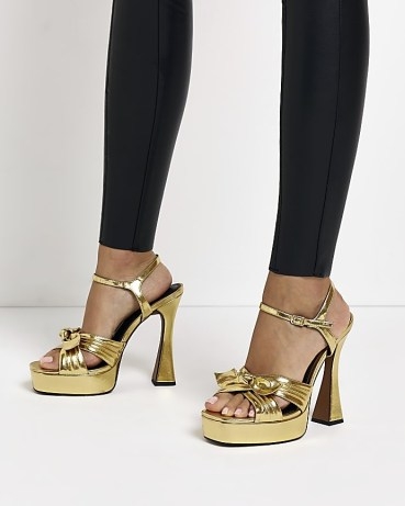 River Island GOLD KNOT PLATFORM HEELED SANDALS – metallic vintage style platforms – luxe evening hees - flipped