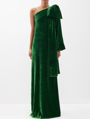 BERNADETTE Nel one-shoulder bow-appliqué velvet gown ~ luxe green gowns ~ occasionwear with statement bows ~ event clothes with asymmetric neckline ~ matchesfashion