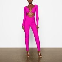 SKIMS LACE UP CATSUIT ~ fitted fuchsia pink catsuits ~ vibrant skinny form fitting jumpsuits
