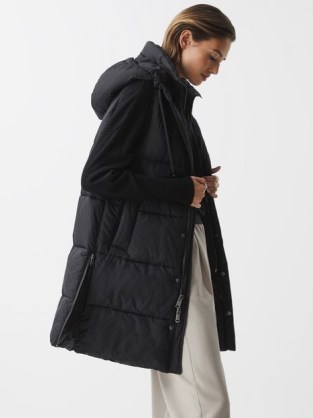 REISS ANTONIA HOODED LONG SLEEVELESS PUFFER JACKET BLACK – women’s longline quilted gilet style jackets – womens stylish padded winter outerwear - flipped