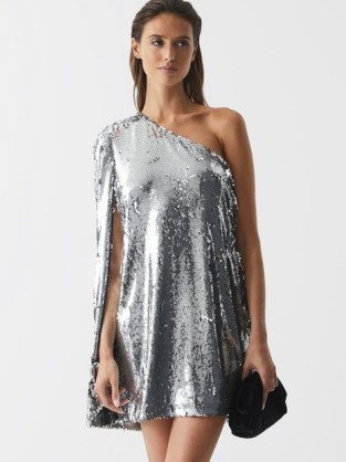 EVA SEQUIN CAPE ONE SHOULDER MINI DRESS SILVER – glamorous evening event dresses – women’s shimmering sequinned party clothes – occasion glamour – asymmetric neckline - flipped