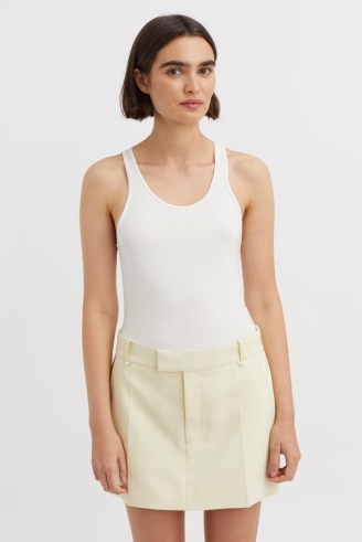 CAMILLA AND MARC Santiago Skirt in Lemon Sorbet – pale yellow low rise mini skirts - flipped