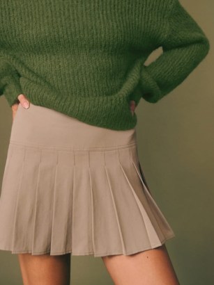 Reformation Tessa Skirt in Khaki – women’s short pleated skirts - flipped