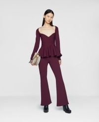 STELLA MCCARTNEY Compact Knit Sweetheart Top in Maple | dark aubergine purple long sleeve peplum tops | ruffle hemline