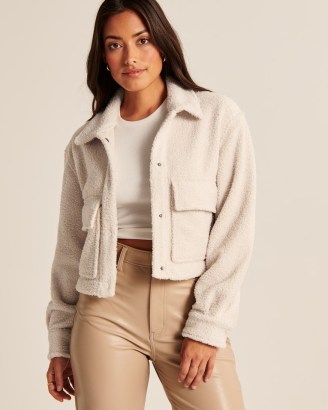 Abercrombie & Fitch Cropped Sherpa Shirt Jacket in Cream – women’s faux shearling crop hem jackets