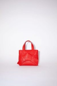 Acne Studios MUSUBI MICRO TOTE in Bright red ~ small vibrant knot detail handbags ~ textured leather top handle bags ~ knotted front