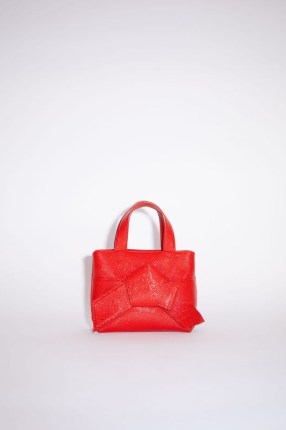 Acne Studios MUSUBI MICRO TOTE in Bright red ~ small vibrant knot detail handbags ~ textured leather top handle bags ~ knotted front - flipped