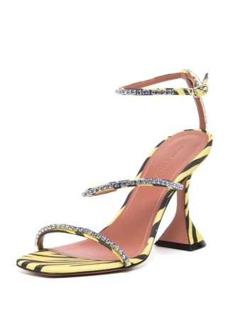 Amina Muaddi Gilda 80mm zebra-print sandals in lemon yellow – sculptural flared heels – animal print barely there ankle strap shoes – glamorous strappy crystal embellished evening footwear