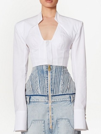 Balmain cropped cotton blouse in white | long sleeved bustier style tops | over extended cuffs | fitted bodice fashion
