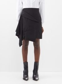 ALEXANDER MCQUEEN Deconstructed wool mini skirt in black | asymmetric drape detail skirts