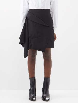 ALEXANDER MCQUEEN Deconstructed wool mini skirt in black | asymmetric drape detail skirts