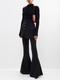 A.W.A.K.E. MODE Skirt-layered crepe flare trousers in black – extreme flares – chic bell bottoms – women’s mini skirt layered trousers