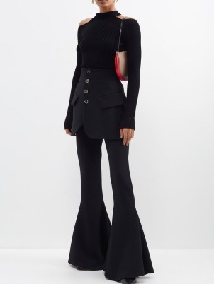 A.W.A.K.E. MODE Skirt-layered crepe flare trousers in black – extreme flares – chic bell bottoms – women’s mini skirt layered trousers