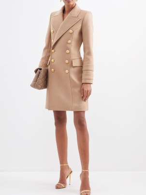 BALMAIN Double-breasted wool coat in camel – luxe light brown padded shoulder coats – gold button detail – matchesfashion women’s outerwear - flipped