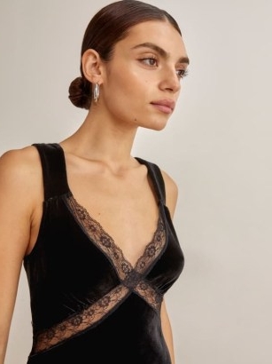 Taylot Swift’s black sleeveless lace panel slip dress, Reformation Lorenzo Velvet Dress. On Instagram, 4 November 2022 | celebrity social media fashion | dresses